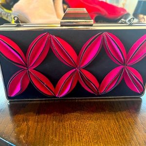 Bright, sassy evening clutch bag.